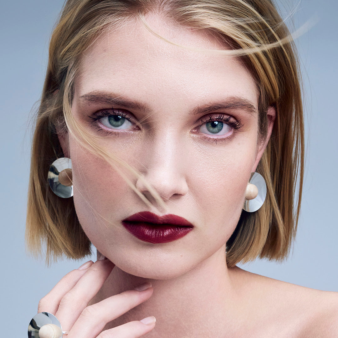 Ava-korvakorut, lakattu puu ja hopea