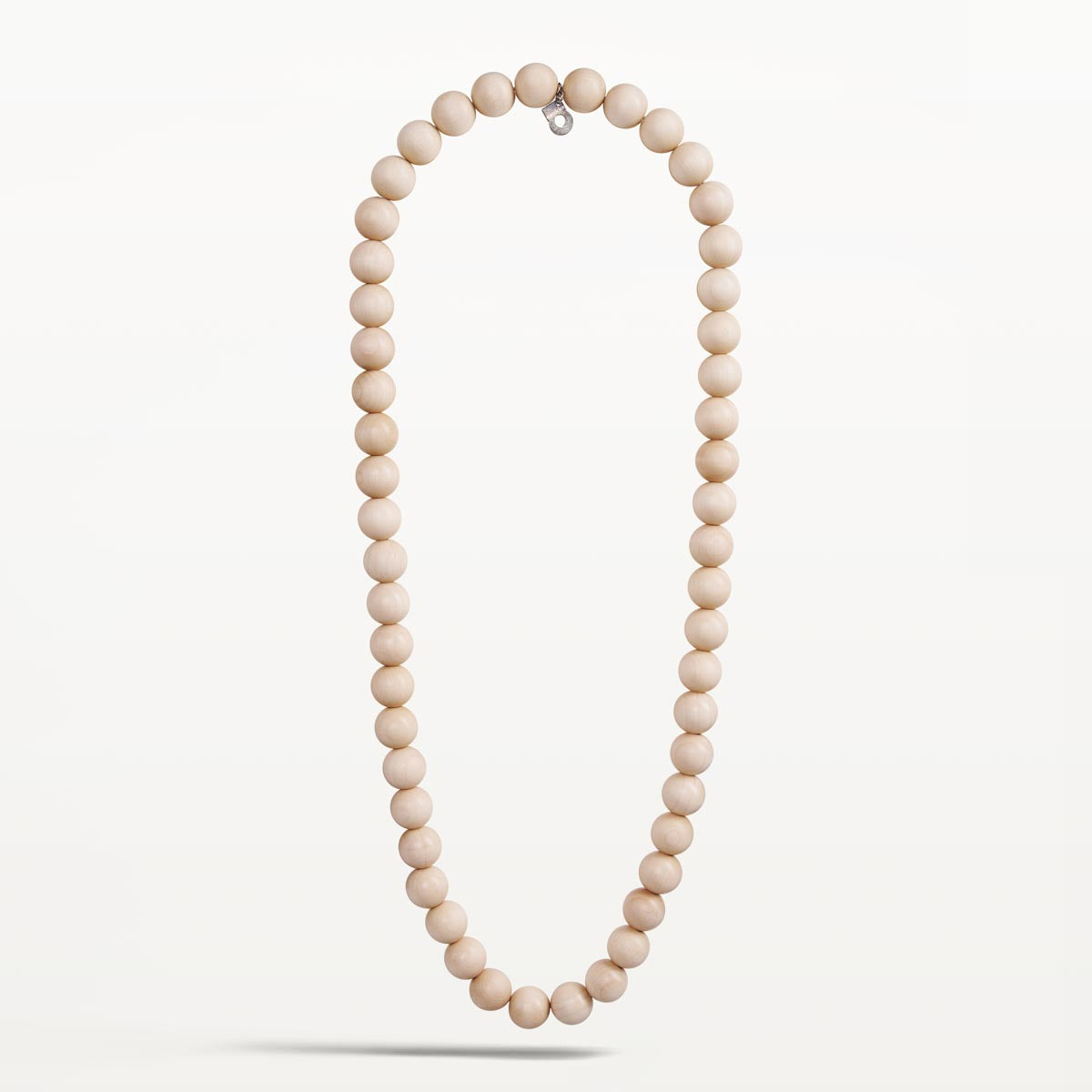 Suometar-kaulakoru, lakattu puu