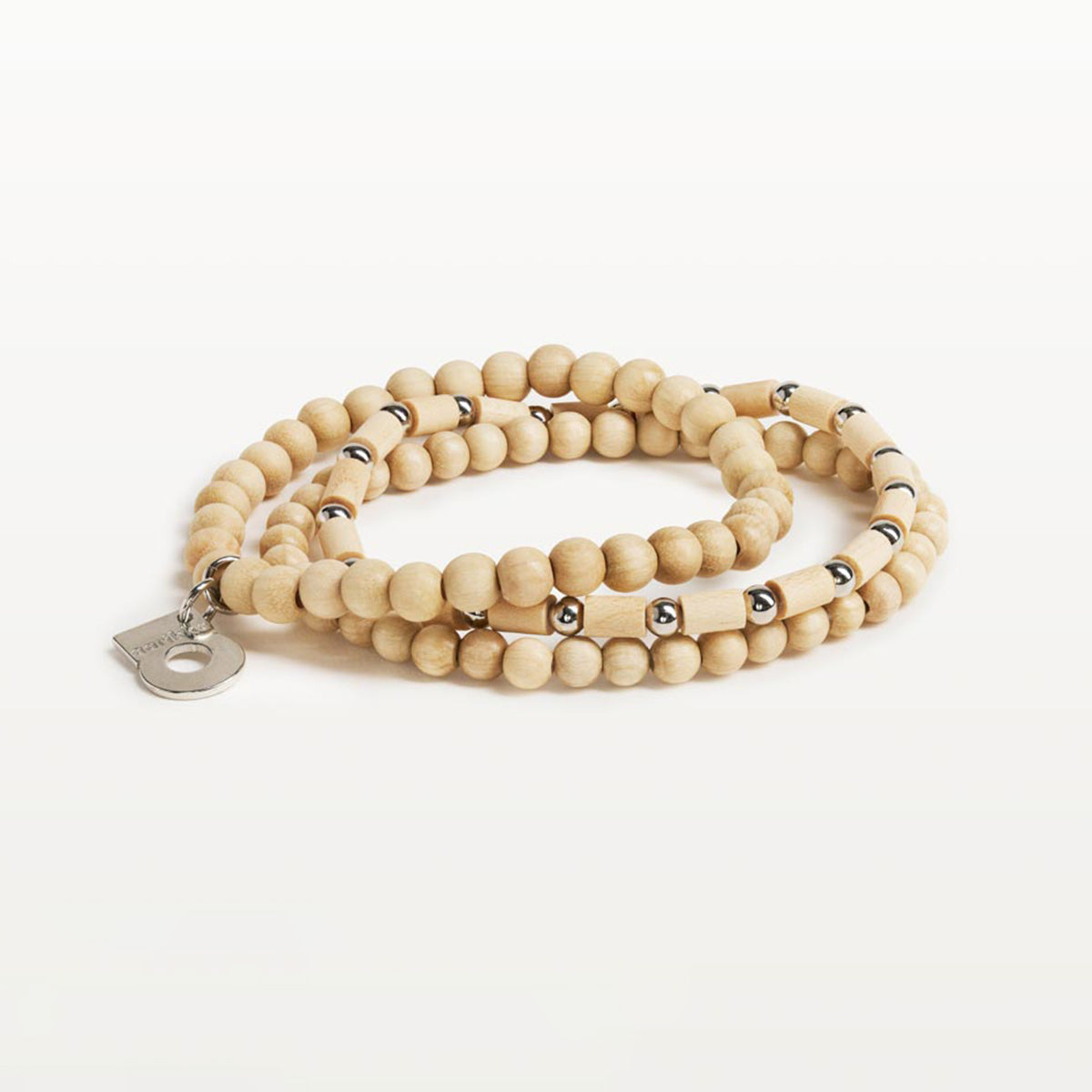 Gunilla-rannekoru, lakattu puu