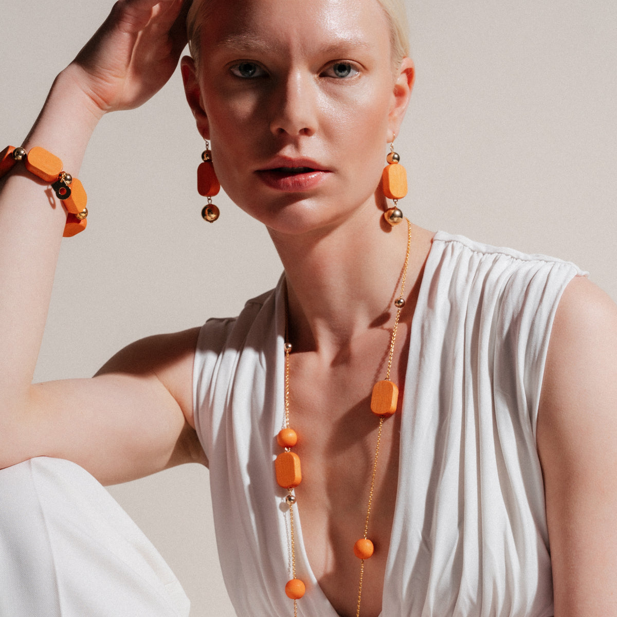 Saimi-rannekoru, oranssi ja kulta