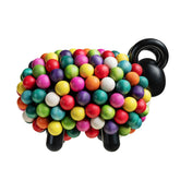 Pässi-veistos, musta/ värikimara