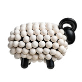 Pässi-veistos, valkoinen