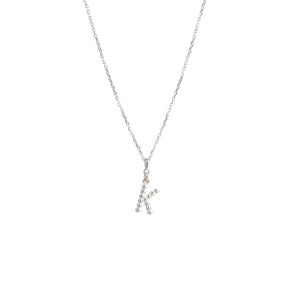 Yllätys-kaulakoru, monogrammi K, hopea