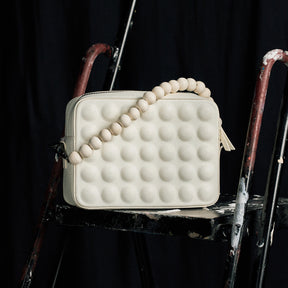 Pop-olkalaukku Auri, kerma